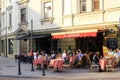 People relax at outdoor Cafe Montmartre in the Old Town, Vilnius Royalty Free Stock Photo