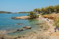 people relax in a small cave in Vouliagmeni, Greece Royalty Free Stock Photo