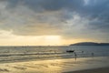 People relax and walking at Ao Nang beach before the sunset Royalty Free Stock Photo