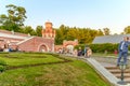 People relax on a warm summer day in the park of the Petrovsky Travel Palace. Royalty Free Stock Photo