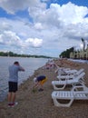 : People relaxing on the alleys with restaurants of a park near Ada Ciganlija lake, serbia
