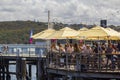 People relaxing at a beach bar Royalty Free Stock Photo