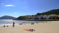 People relaxing at Cedeira beach on a sunny day in Galicia Rias Atlas, Spain