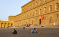 People relaxing in front of Palazzo Pitti in Florence, Italy Royalty Free Stock Photo