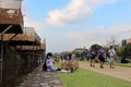 People relaxing in Kamo river. Its riverbanks are popular walking spots for residents and tourists.