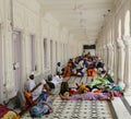 People relaxing at lobby of the Golden Temple in Amritsar, India