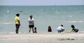 People relaxing at manao beach in thailand