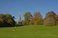 People relaxing on a meadow in the park of Laeken, Brussels