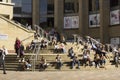 People relaxing next to Glasgow Royal Concert Hall