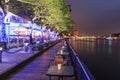 People relaxing in one of the restaurants alogn the Love River of Kaohsiung, Taiwa