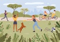 People relaxing in park. Girls playing frisbee with dog pet. Female friends riding bicycle with baskets Royalty Free Stock Photo