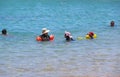 People relaxing in sea. Tourists swimming in Red sea during vacation Royalty Free Stock Photo