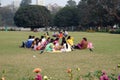 People relaxing in the Victoria Memorial gardens in Kolkata