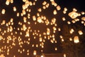 People release Khom Loi, the sky lanterns during Yi Peng or Loi Krathong festival Royalty Free Stock Photo