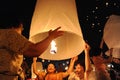 People release Khom Loi, the sky lanterns during Yi Peng or Loi Krathong festival Royalty Free Stock Photo