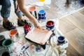 People renovating the house wall painting