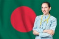 People Republic of Bangladesh healthcare concept with doctor on flag background. Medical insurance, work or study in the country
