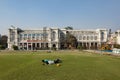 people rest at Connaught Place. It is one of the largest financial, commercial and business centers in Delhi, India