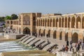 People resting in the ancient Khaju Bridge, (Pol-e Khaju), in Isfahan, Iran