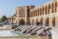 People resting in the ancient Khaju Bridge, (Pol-e Khaju), in Isfahan, Iran