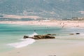 People resting at beach in Tarifa, Spain.