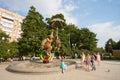 People are resting near Clowns sculpture in Tsvetnoy Boulevard