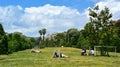 People resting at Parc de la Ciutadella in Barcelona, Spain