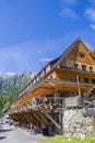 People resting at the restaurant in the High Tatras near Popradske Pleso