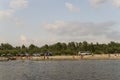 People resting and sailing. Summer beach on one of the banks of river Desna. Oster, Ukraine. Juny 17, 2017