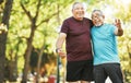 People, retired and workout for wellness in closeup at park in embrace, smile and laughing at joke. Mature, men or