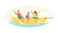 People ride banana water attraction. Yellow cigar shaped inflatable object for fun jumping waves Royalty Free Stock Photo