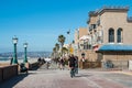 People Ride Bikes on Mission Beach Boardwalk in San Diego Royalty Free Stock Photo