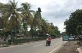 People ride motorbike on street at Borobudur, Indonesia