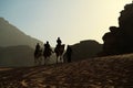 People rides on camels in Wadi Rum desert in Jordan Royalty Free Stock Photo