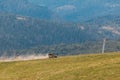 people riding on all terrain vehicle by mountains Royalty Free Stock Photo