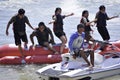 People riding on a banana boat in bali beach Royalty Free Stock Photo