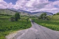 People riding bicycles on the scenic roads of Black Valley in county Kerry, Ireland