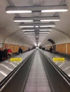 People are riding horizontal escalators Royalty Free Stock Photo