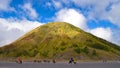 People Riding Horse At Mt Bromo Against Sky