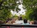 People riding  the Jurassic Park water ride at Universal Studios Royalty Free Stock Photo