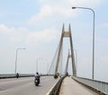 People riding motorbikes on the bridge in Haiphong, Vietnam Royalty Free Stock Photo