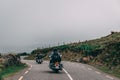 People riding in motorcycles along the scenic road to Conor Pass in county Kerry, Ireland Royalty Free Stock Photo