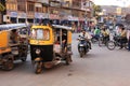 People riding tuk-tuks and motobikes at Sadar Market, Jodhpur, I Royalty Free Stock Photo