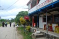 People at road near guesthouse South Pacific