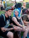 People rock fans with tattoos at the festival