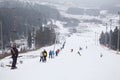 People on rope tow on ski resort