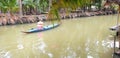 People Rowing Boat in a Canal at Coconut Farm