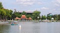 People rowing boat at the city park in Angiang, Vietnam