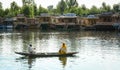 People rowing boat on the lake in Srinagar, India Royalty Free Stock Photo