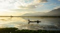 People rowing boat on lake in Srinagar, India Royalty Free Stock Photo